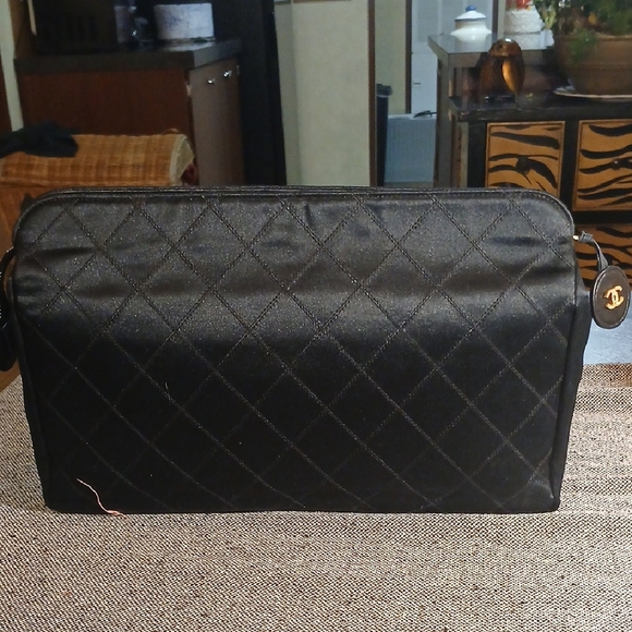 CHANEL Handbags - CHANEL Black Quilted Clutch